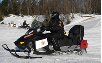 Sheriff's Deputy on a snowmobile